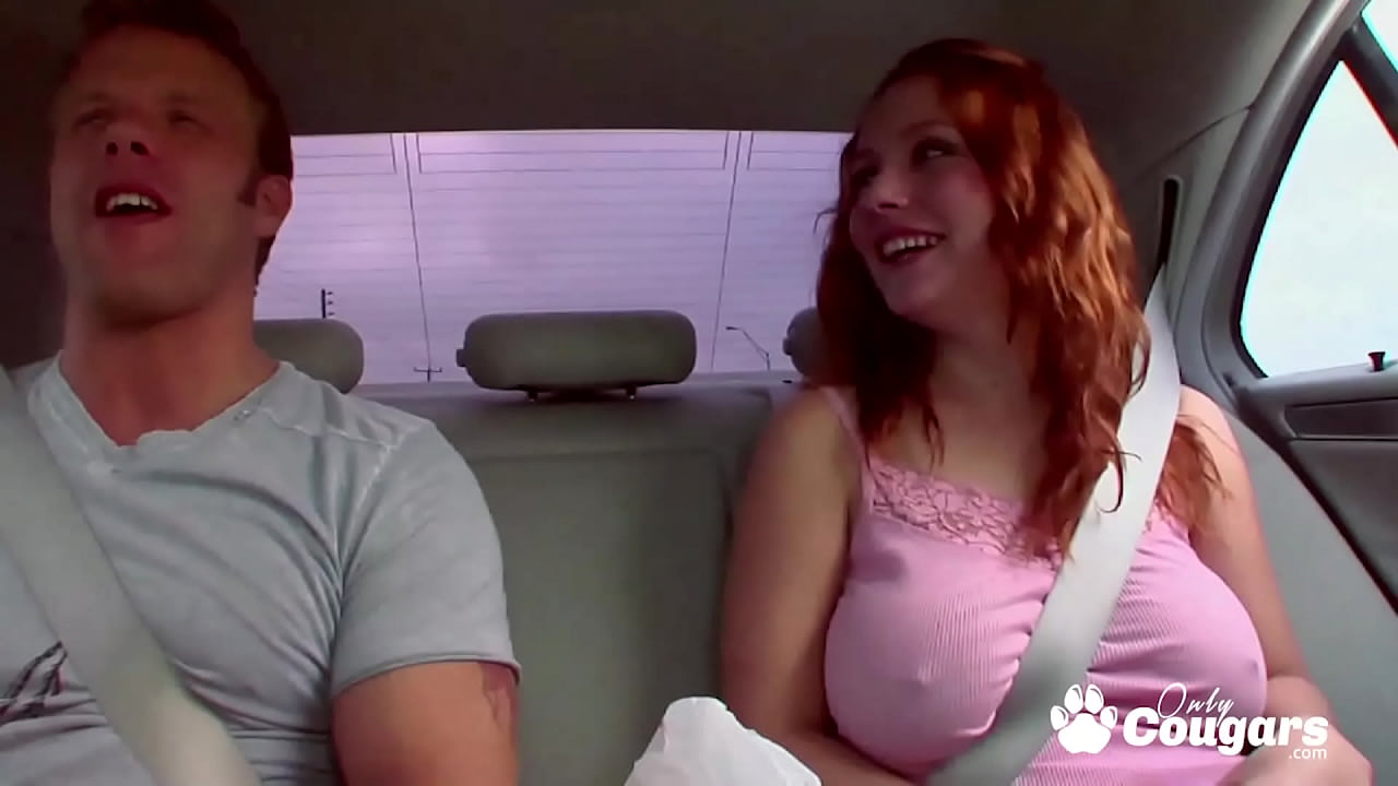 Redhead Rebecca Lane with giant breasts jumping on dick