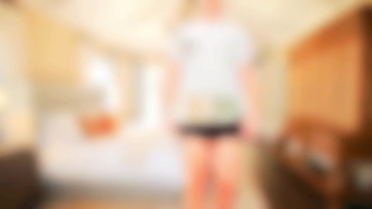 Cute sissy playing shy while holding soft pillow