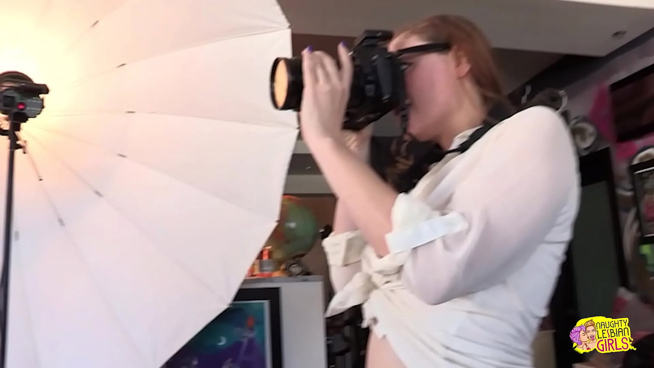 During a nude picture session, two gorgeous girls get really aroused.