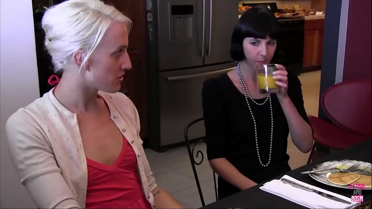 The slender brunette serves as an ideal sexually aroused submissive for her lesbian dominatrix.