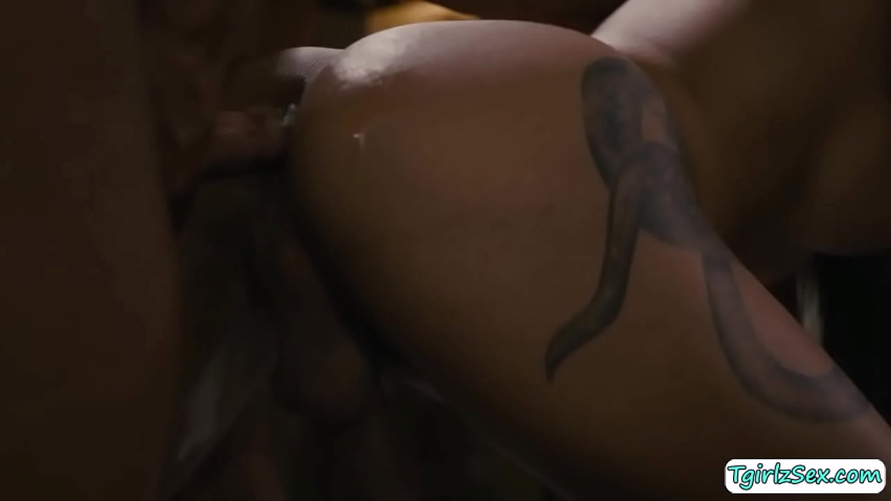 Masseuse Dillion Diaz leads busty latina Transsexual Eva Maxim in the massage where he lays her naked sexy shaped body then oils it to rub.