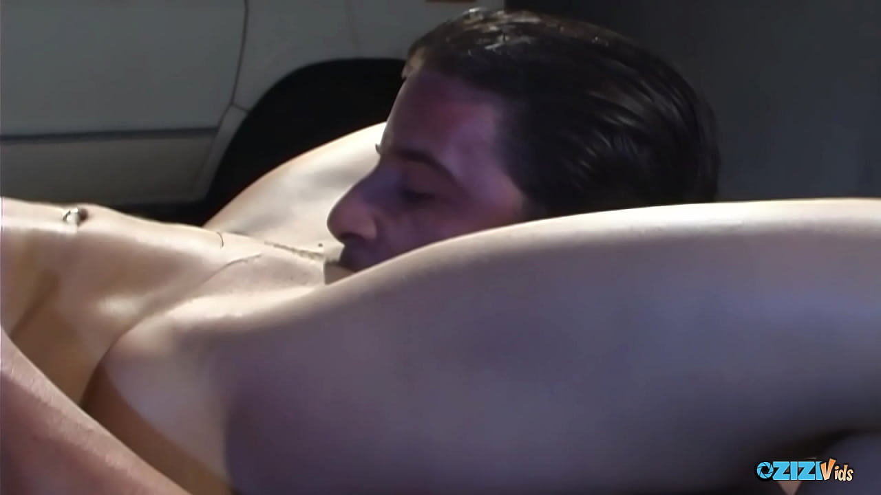 April groans as Julian forcefully inserts his lengthy dick into her shaven genitals inside the car.