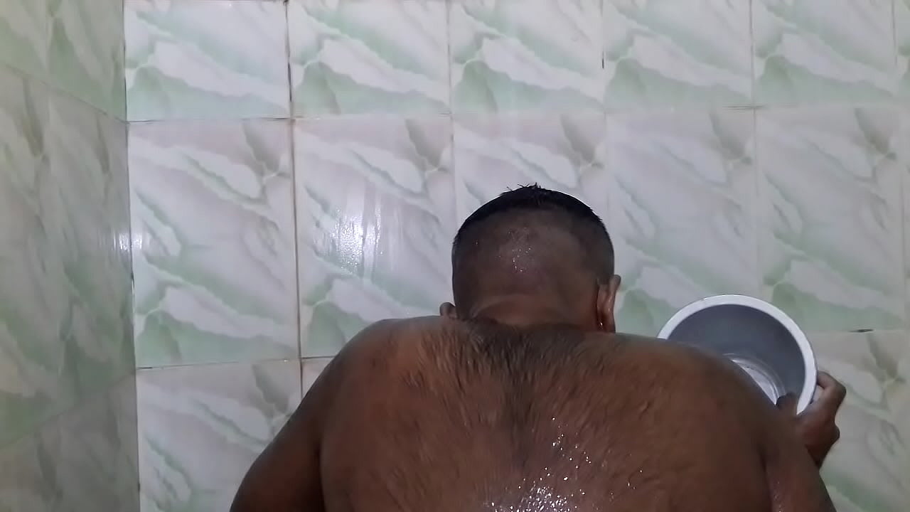 indian guy taking shower
