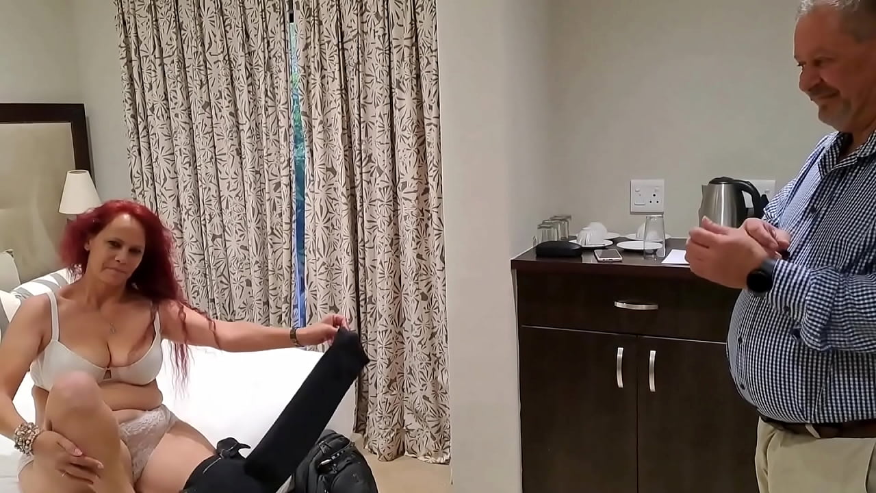 Amateur cuckold husband watches wife fuck older stranger bareback in hotel room.