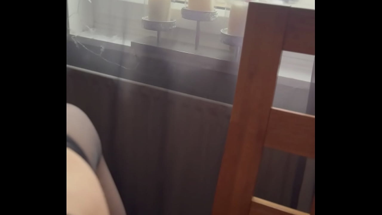 Opening my legs in front of the window with stockings and suspenders