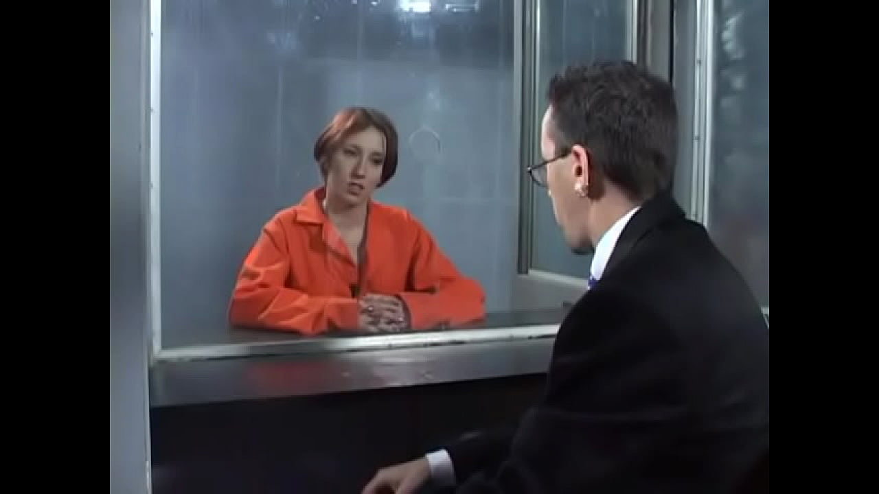 Slim inmate with short red hair moans as her ass gets fucked by hot blonde cop in sunglasses