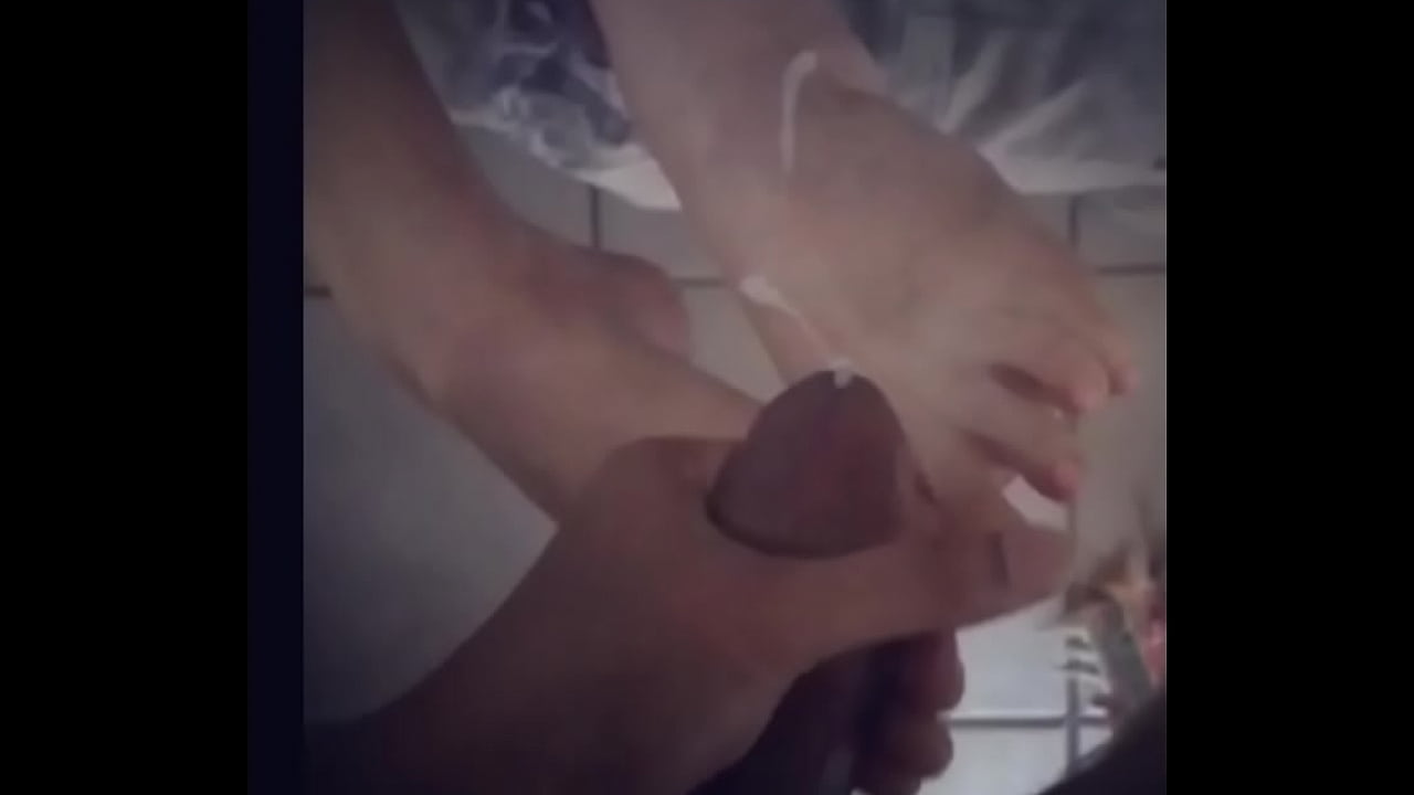 White hotwife giving a footjob to her BBC and getting her feet covered in cum