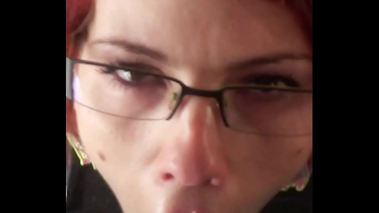 Glassed-up Karla Rose drops to her knees, locking eyes in POV while sucking my wrapped cock with hungry force.