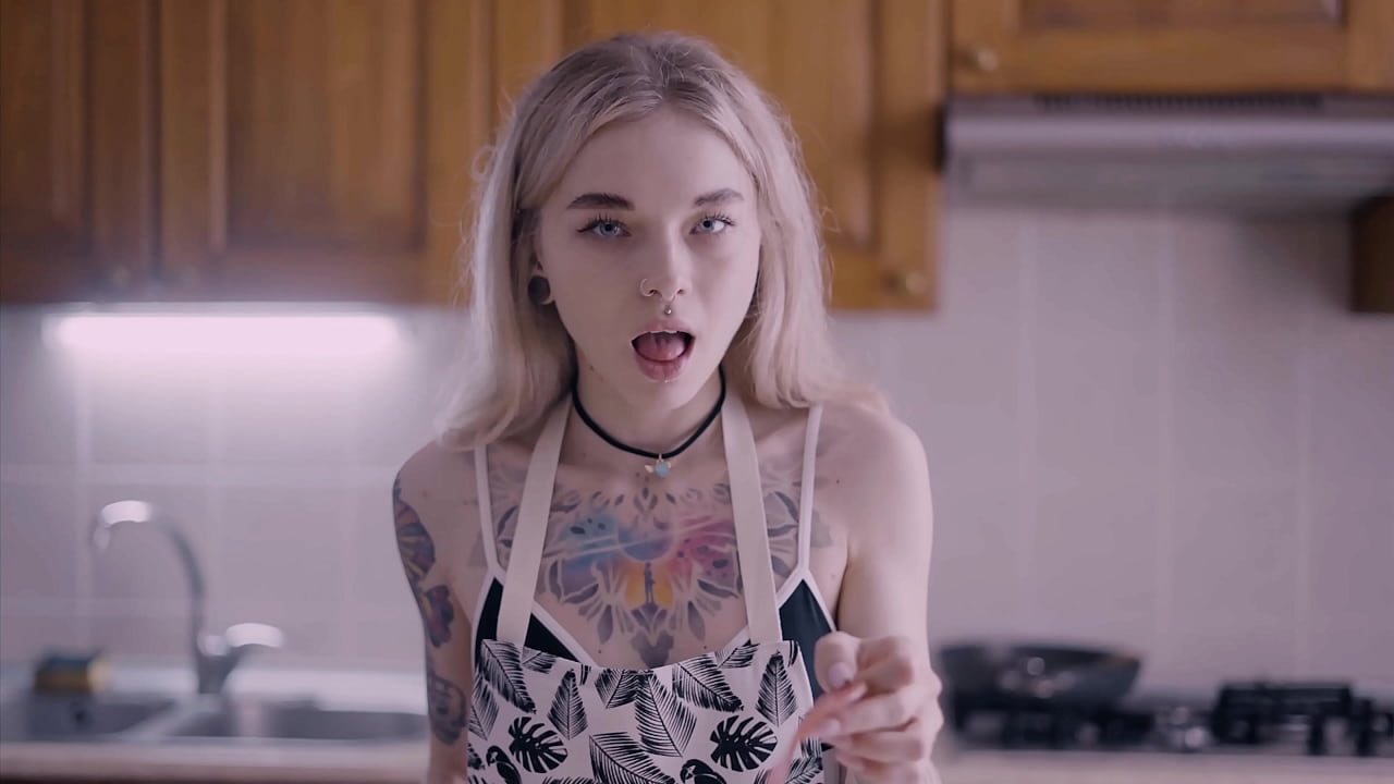 Sexy housewife has fun in the kitchen