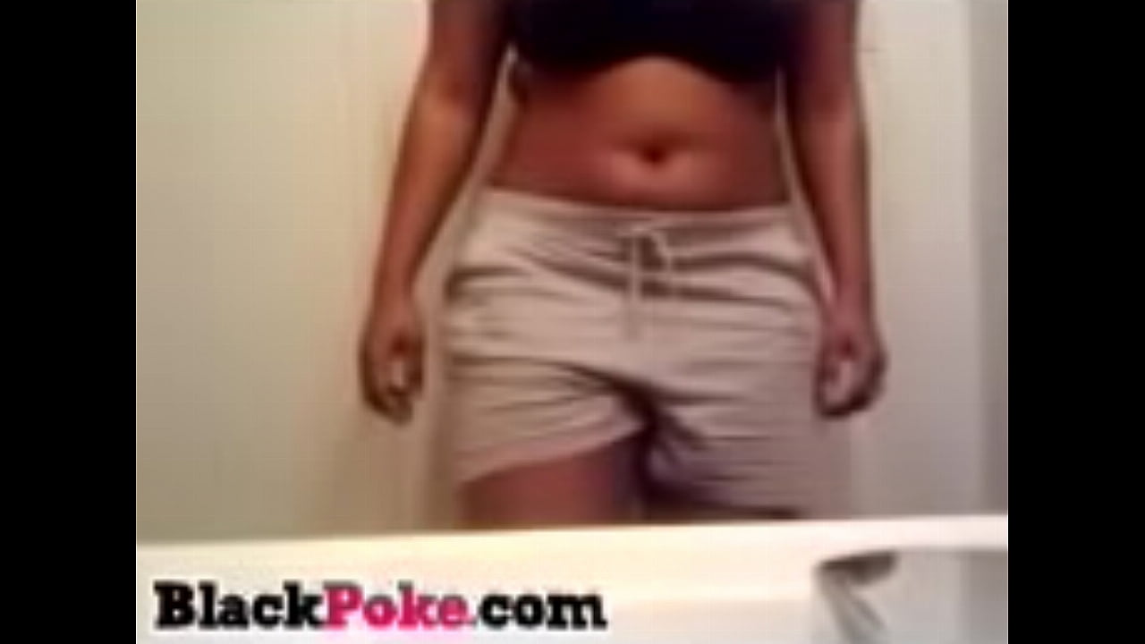 Busty black babe takes off her clothes