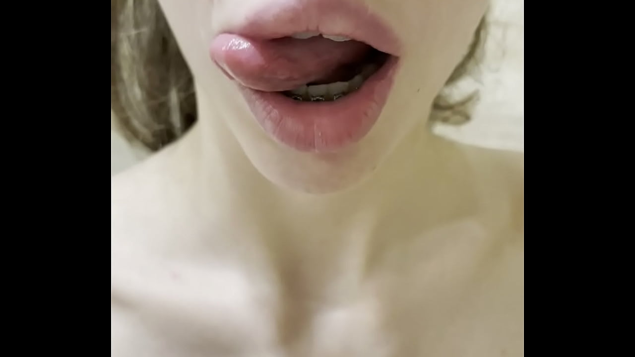 beautiful girl sucks sweetly in the shower