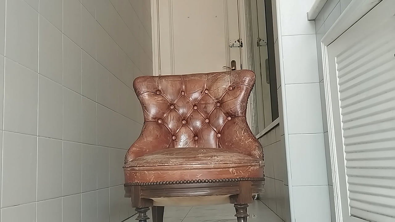 Guy of big dick takes armchair to bathroom and masturbates