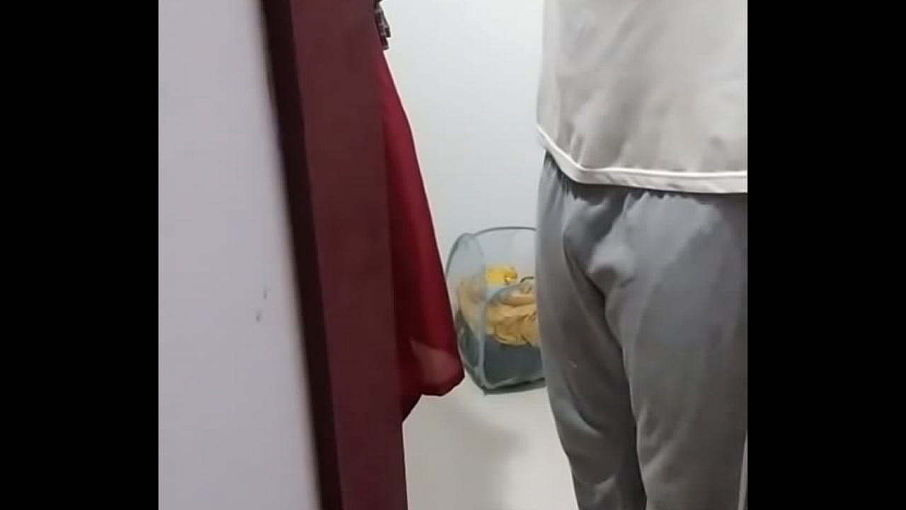 Indian guy cloths up in home