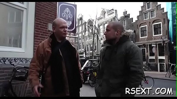 Black cutie sucks a large pole