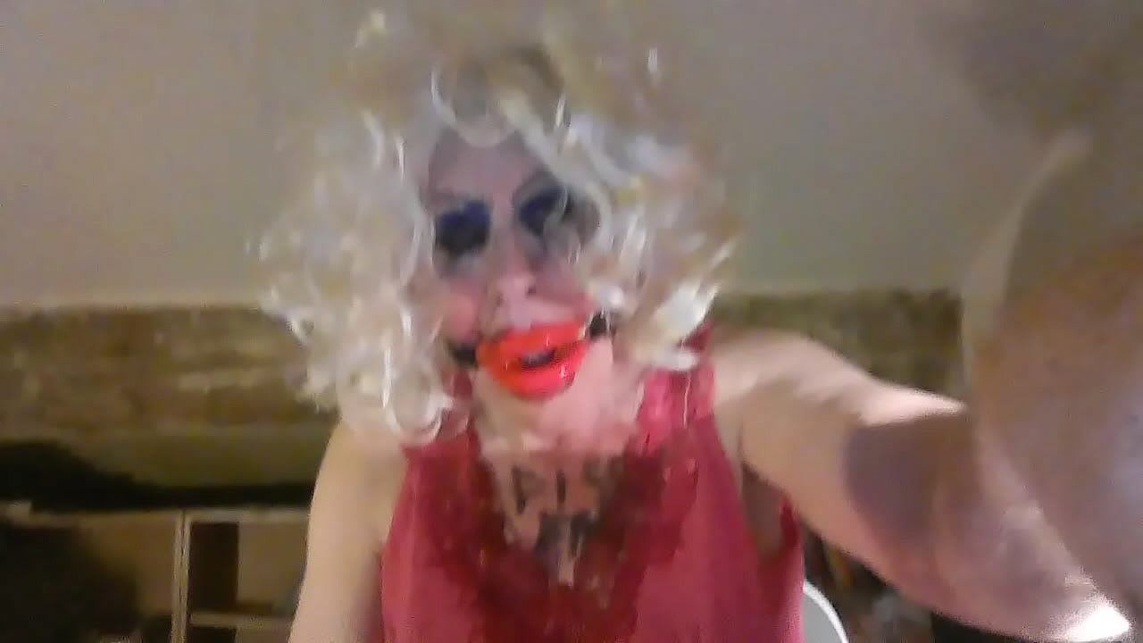 Pee stained Tranny, Sarah Millward, inserts 8 inch dildo through mouth gag, then up her 'vagina,' masturbates cocklet - for you to cum over