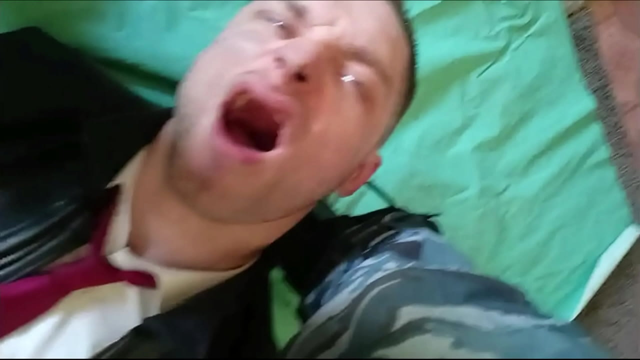 Two cops arrested guy in suit and spit piss and hit him