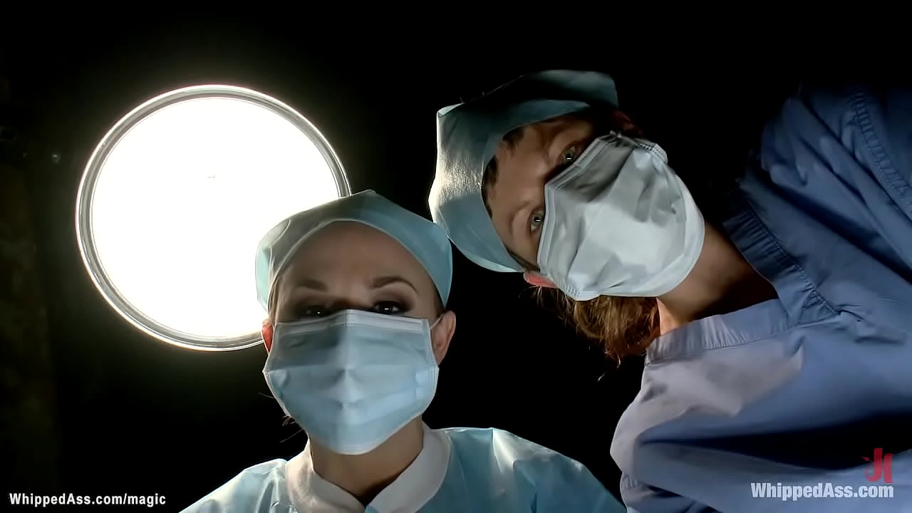 Strapped and gagged in medical chair brunette lesbian patient Cassandra Nix is dominated by doctor in latex Chanel Preston then spanked in suspension