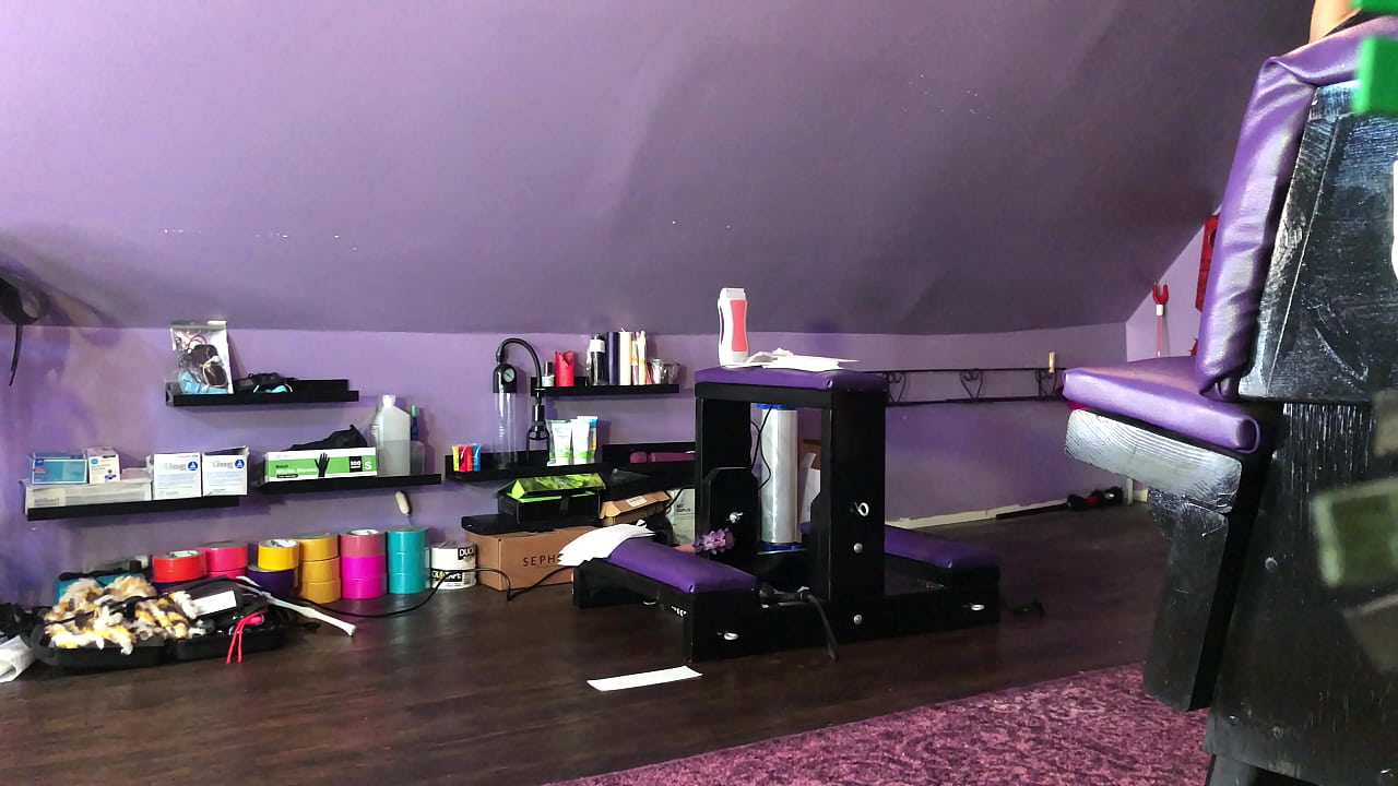 Dominatrix Waxing Man;s Legs