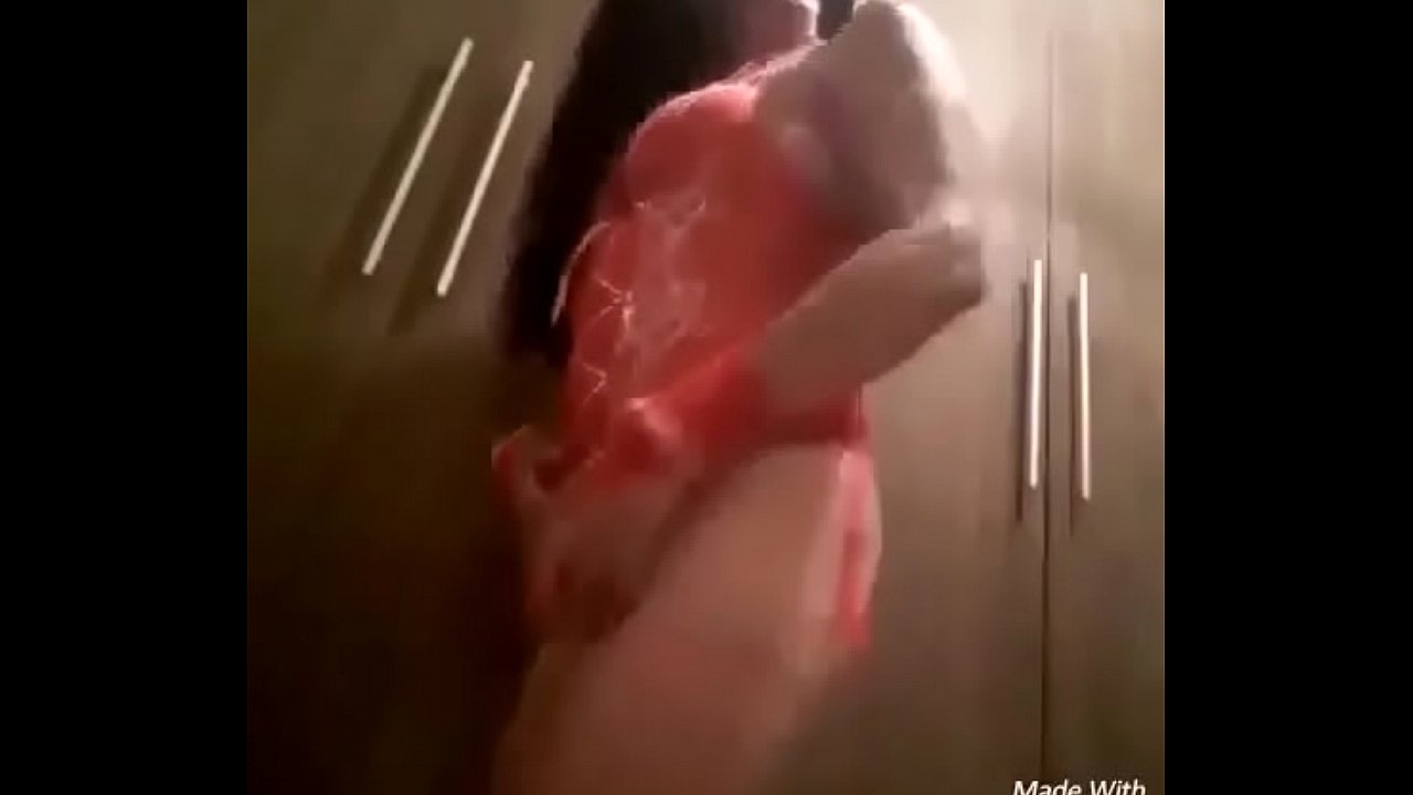 showing very sexy in red lingerie on a strip taking everything