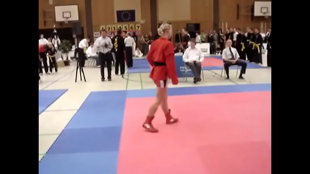 Young girl wrestle man