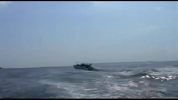 Two hot latina sluts in latex dress show off their body in a tropical beach