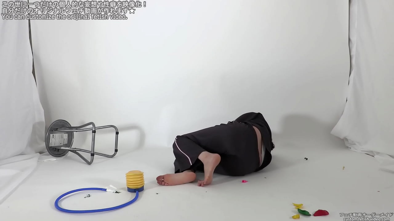 A woman screaming by popping a balloon