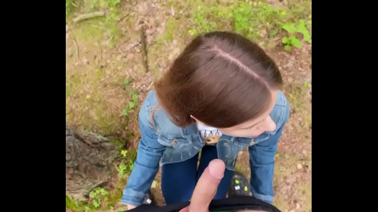 Brunette babe loves sucking my cock outdoors