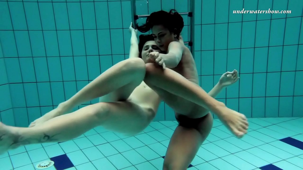 Hot lesbos in the swimming pool naked