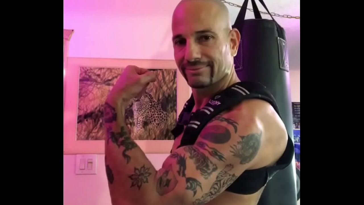 FLEXING BICEP MUSCLES