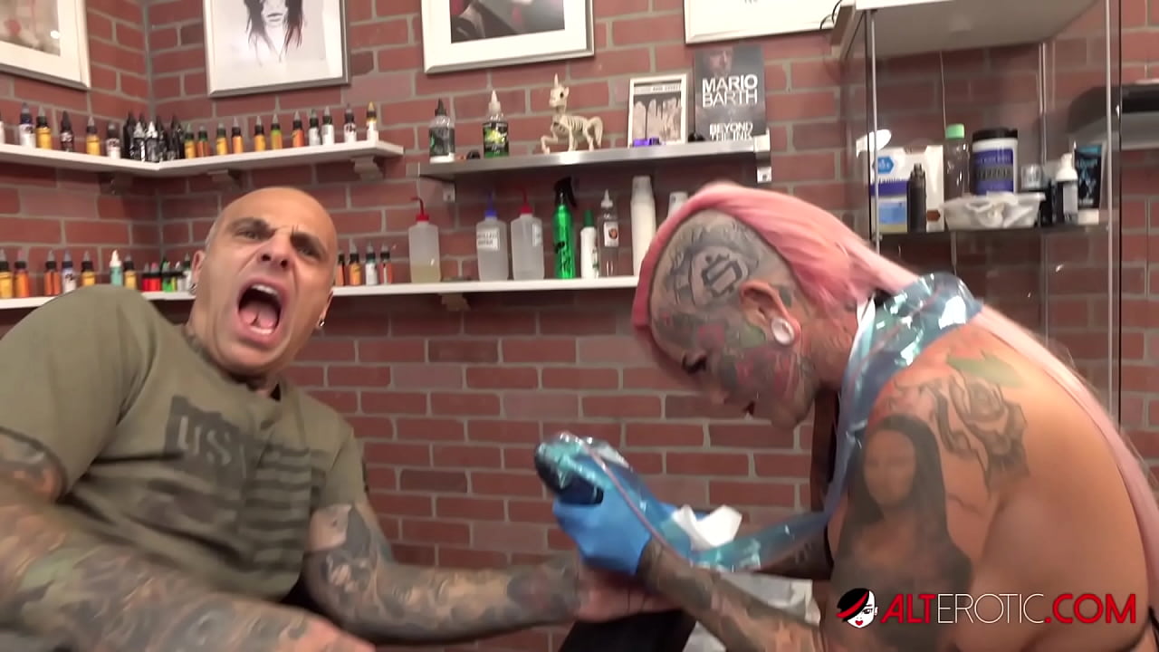 Inked up babe tattoos her friend then lets him stuff her cunt