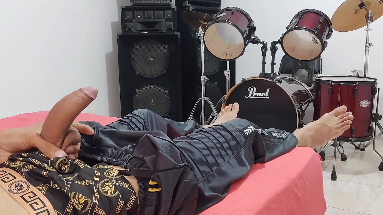 man masturbates his big cock in front of the camera