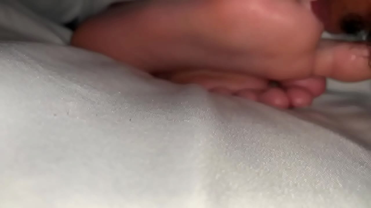 Licking Latina Soles in Bed