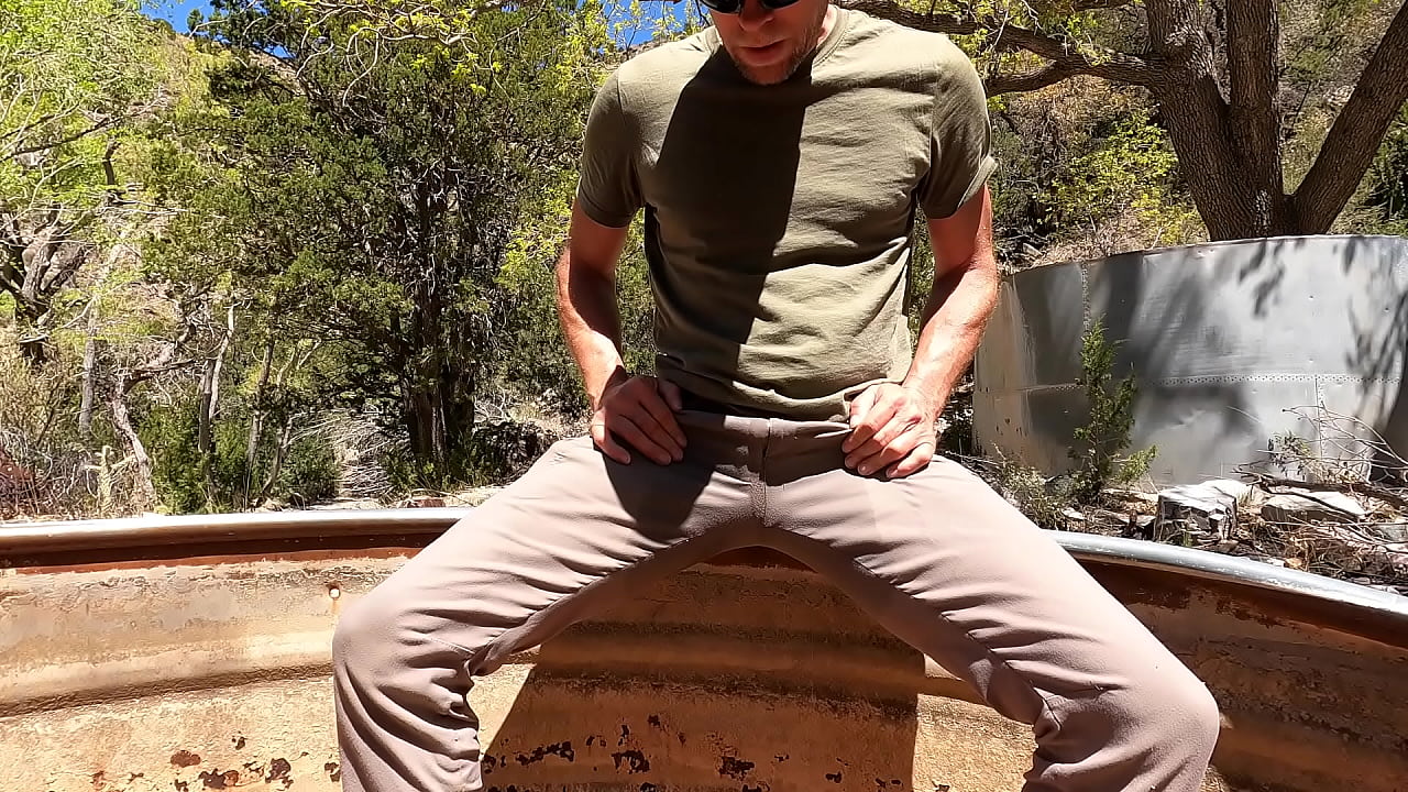 Wetting and pouring piss on myself while hiking