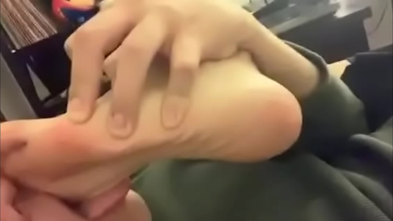 Sexy guy licking his soft sweaty feet