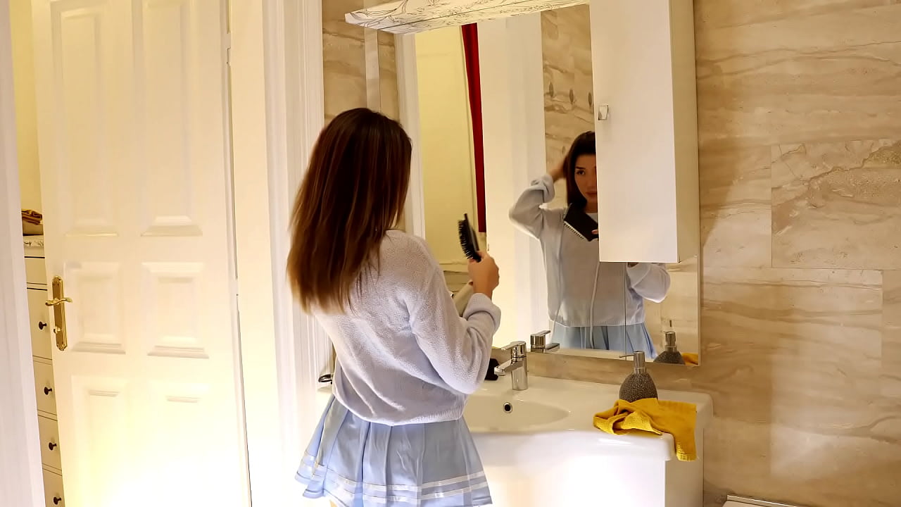 Sexy and horny Asian brunette babe in her miniskirt changes clothes and does a panties try on with skirts