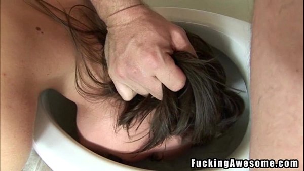 Pretty brunette sucks in the toilet