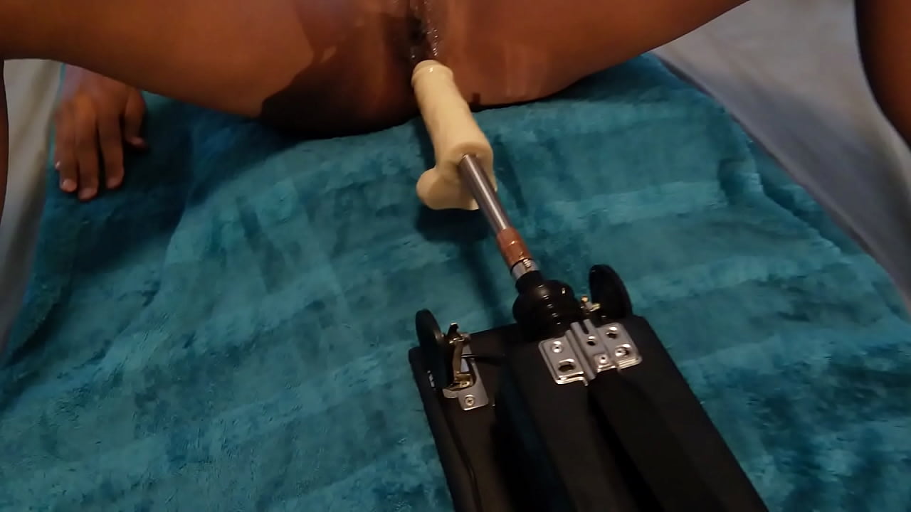 Enjoying a fuck from a sex machine