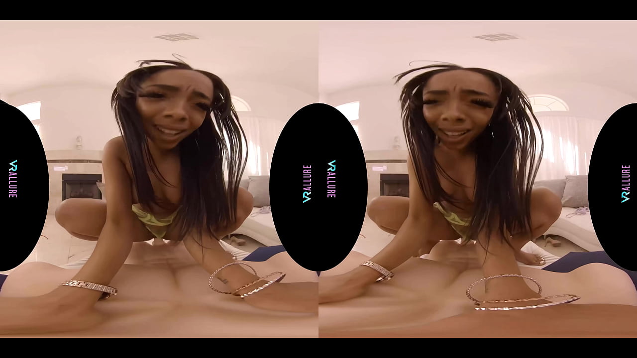 Beautiful ebony babe plays with her toys in virtual reality