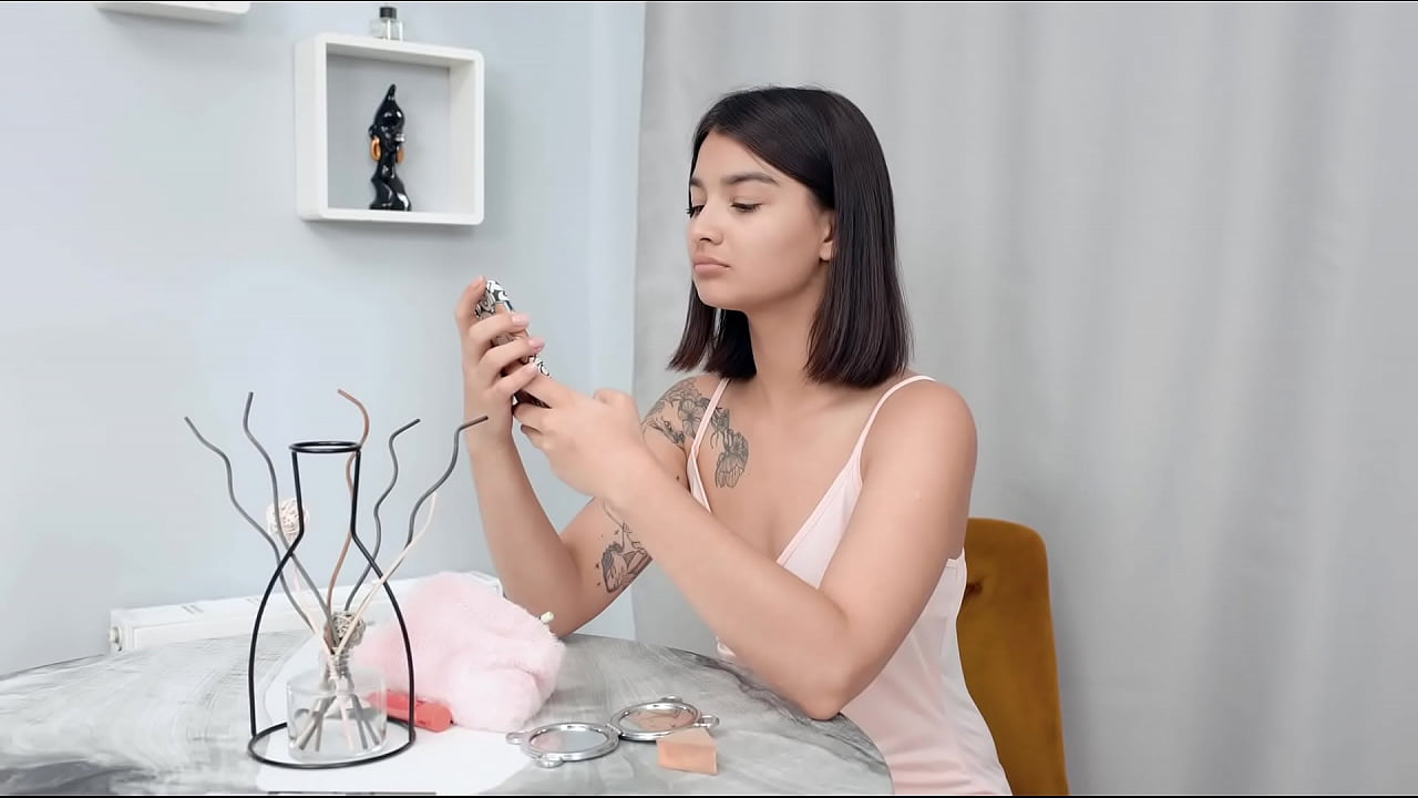 Dark-haired Sasha X-Ray puts on beautiful makeup and a sexy outfit