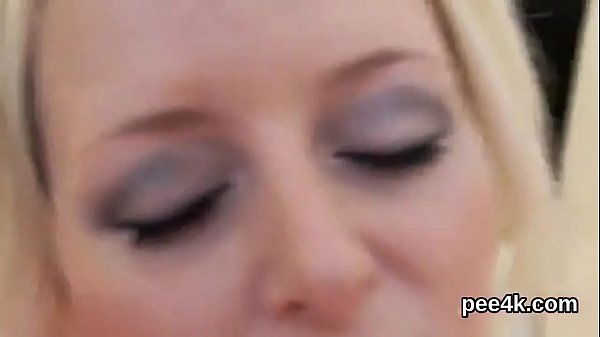 Flirtatious chick enjoys pissing cock and gets splashed with piss