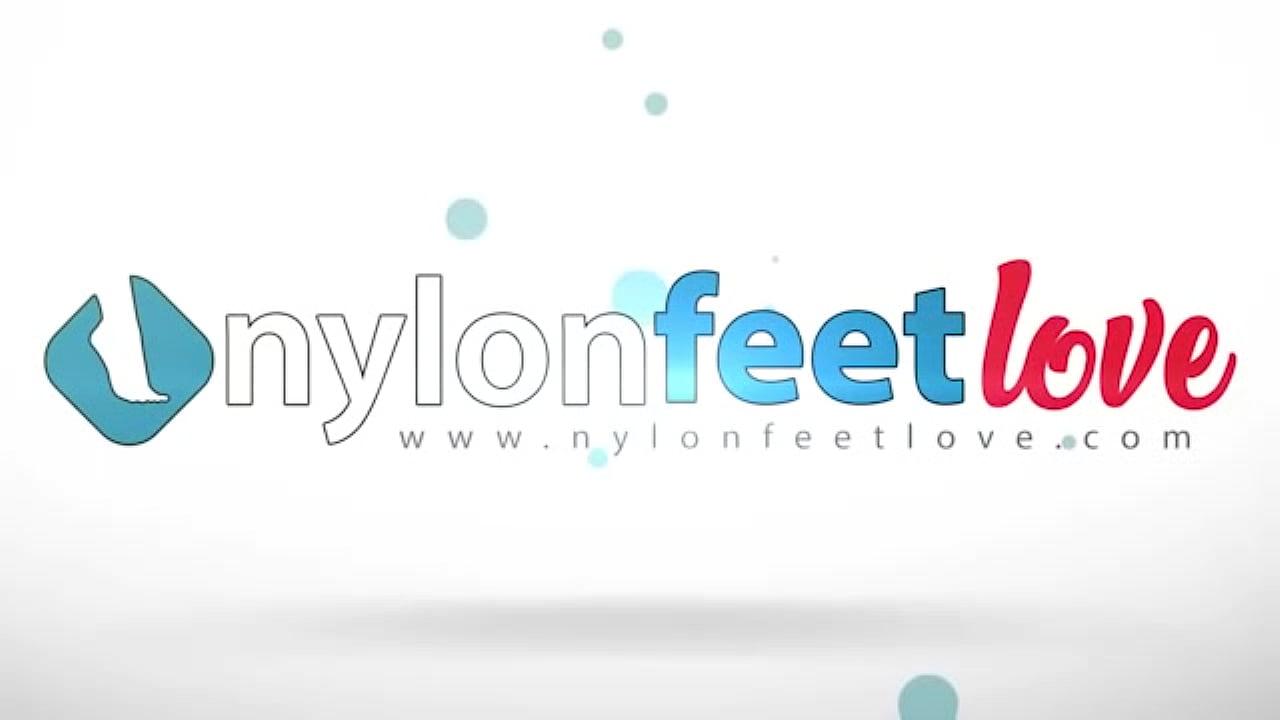 Bianca is so sexy while she smokes her cigarette and puts her feet in red RHT stockings over the table!