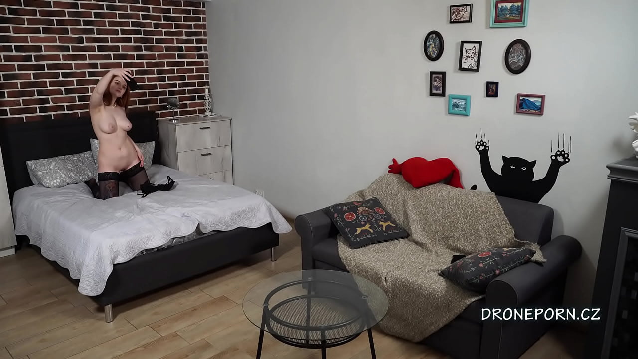 Redhead girl with big tits