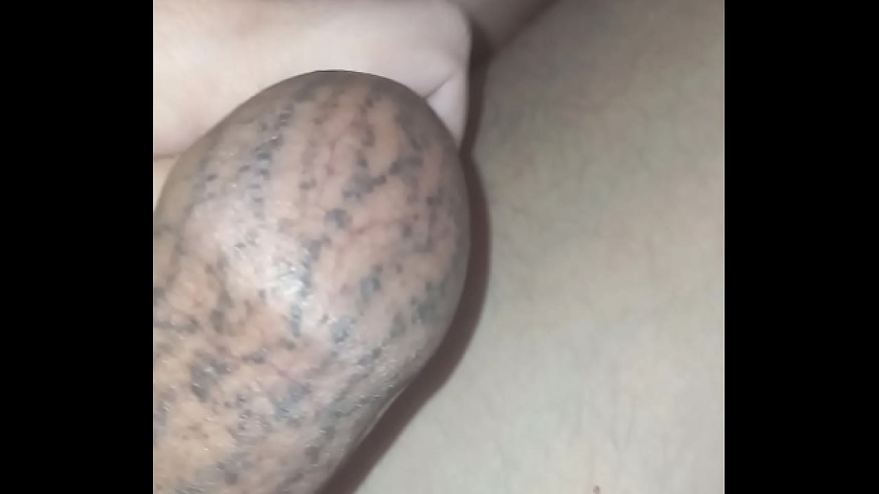 Milking tattooed penis by the long foreskin. I come by pulling the skin without masturbating my penis. A very pleasant feeling like being sucked