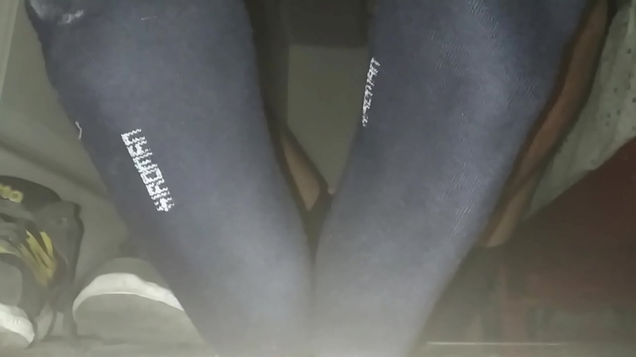 gray sneakers and sweaty foot in my room with jerk