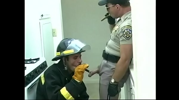 Fireman doing blowjob to cop