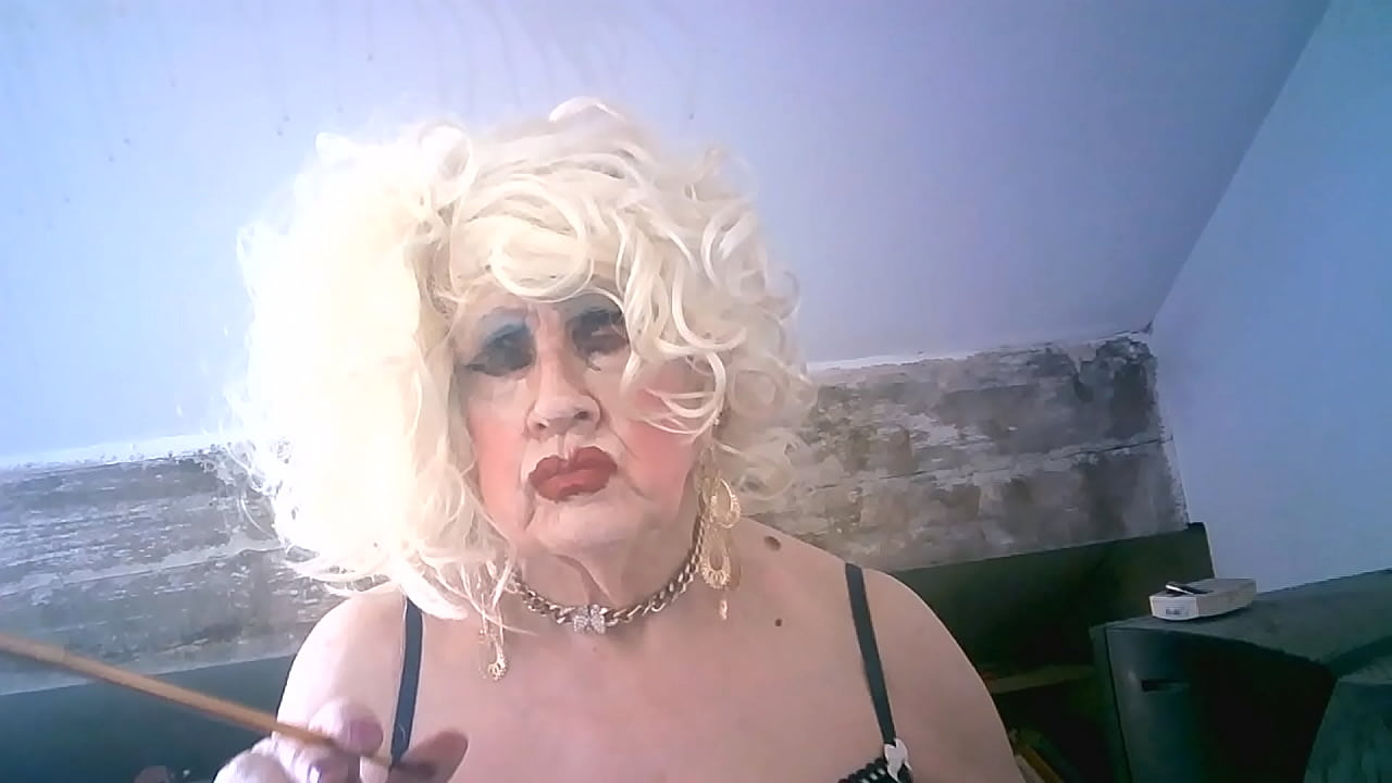 Sarah tries to look classy, smoking with a holder, though actually a filthy  cumdump whore