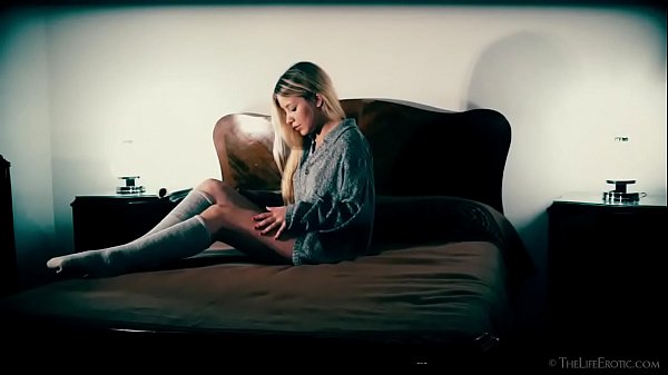 Lusty young babe pleasures her shaved cunt