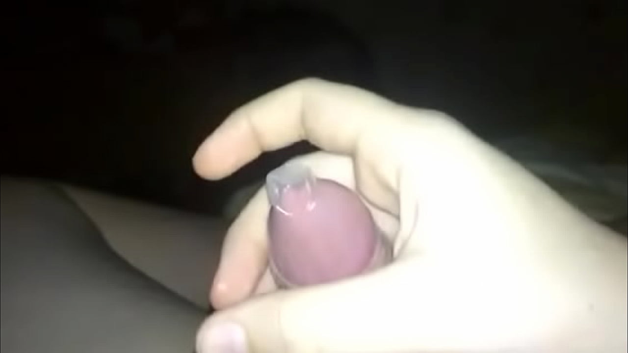 teen twink puts on condom and masturbates