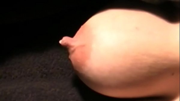 Watch Her Nipples Growing Erect and Dripping Milk