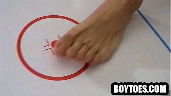 Stud tugs on his cock and plays air hockey with his feet